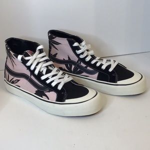 black and pink high top vans